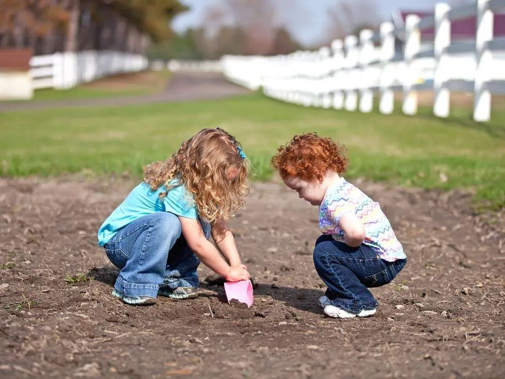 Kids digging in regular dirt